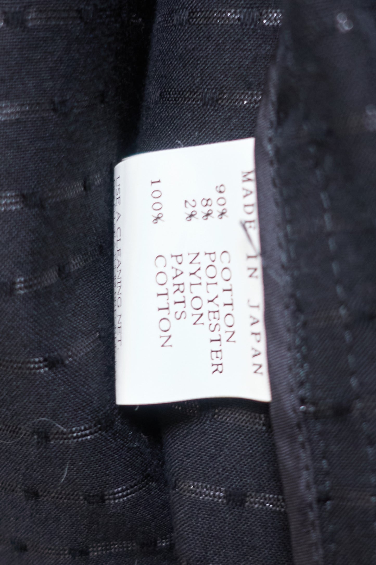 Limi Feu sparkly lightweight double breasted coat with short sleeves