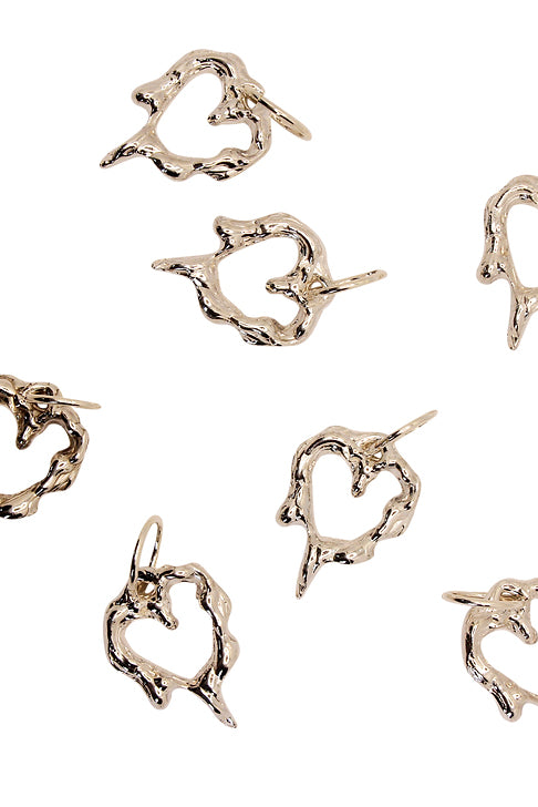 Sacreflux silver fluid love earrings