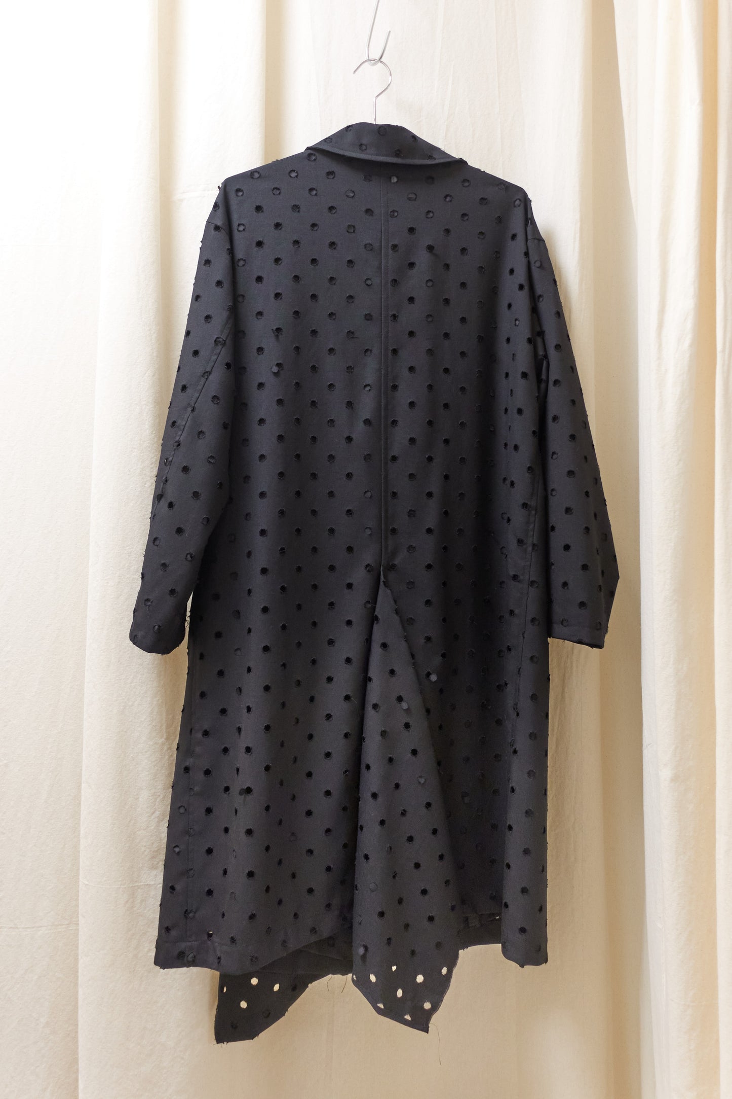 Yohji Yamamoto Y's asymmetrical 'holepunch' coat