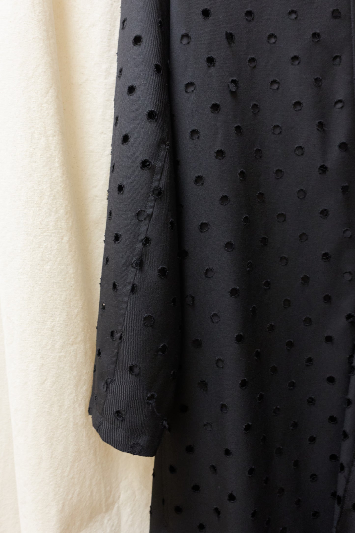 Yohji Yamamoto Y's asymmetrical 'holepunch' coat