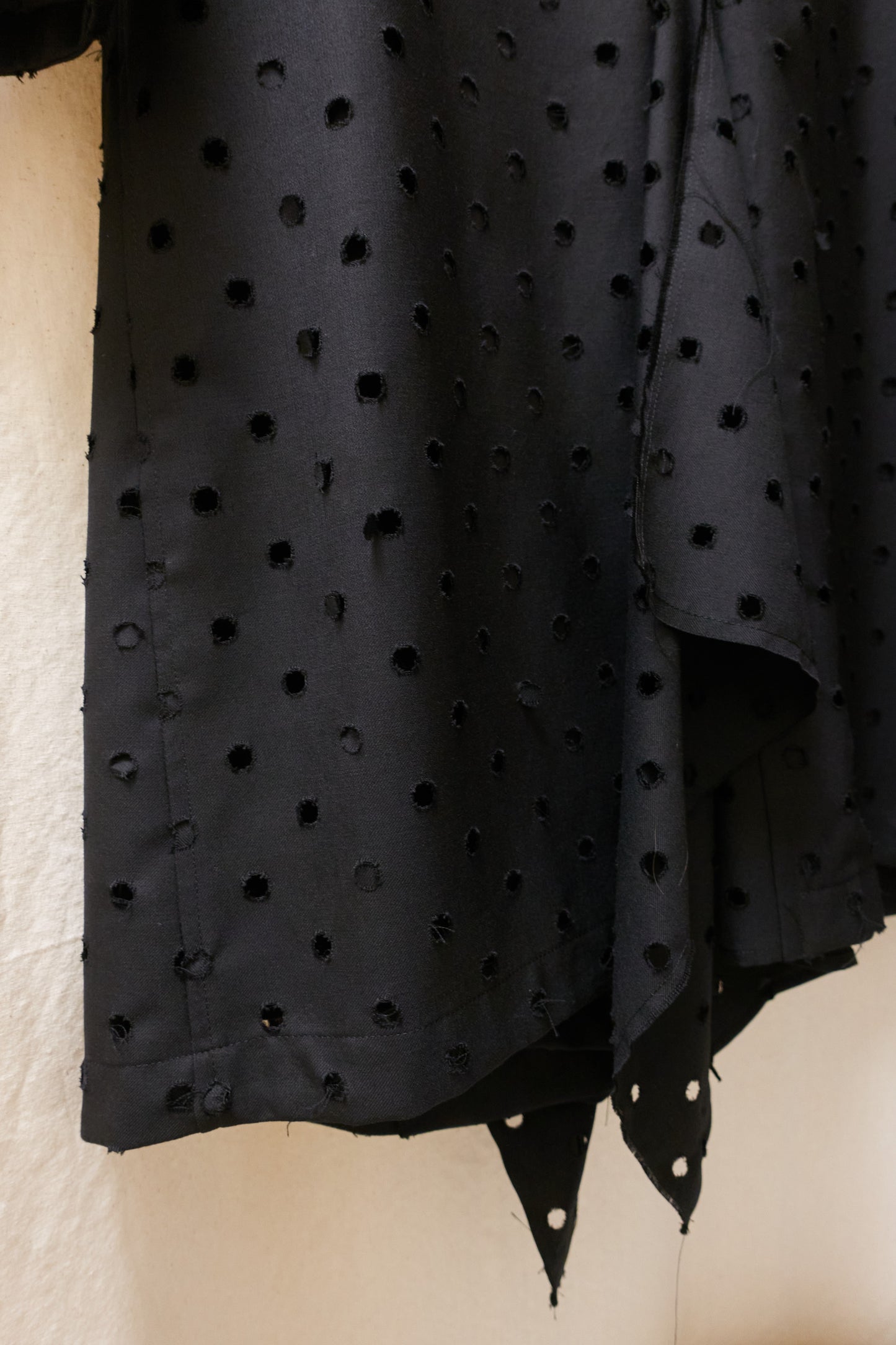 Yohji Yamamoto Y's asymmetrical 'holepunch' coat