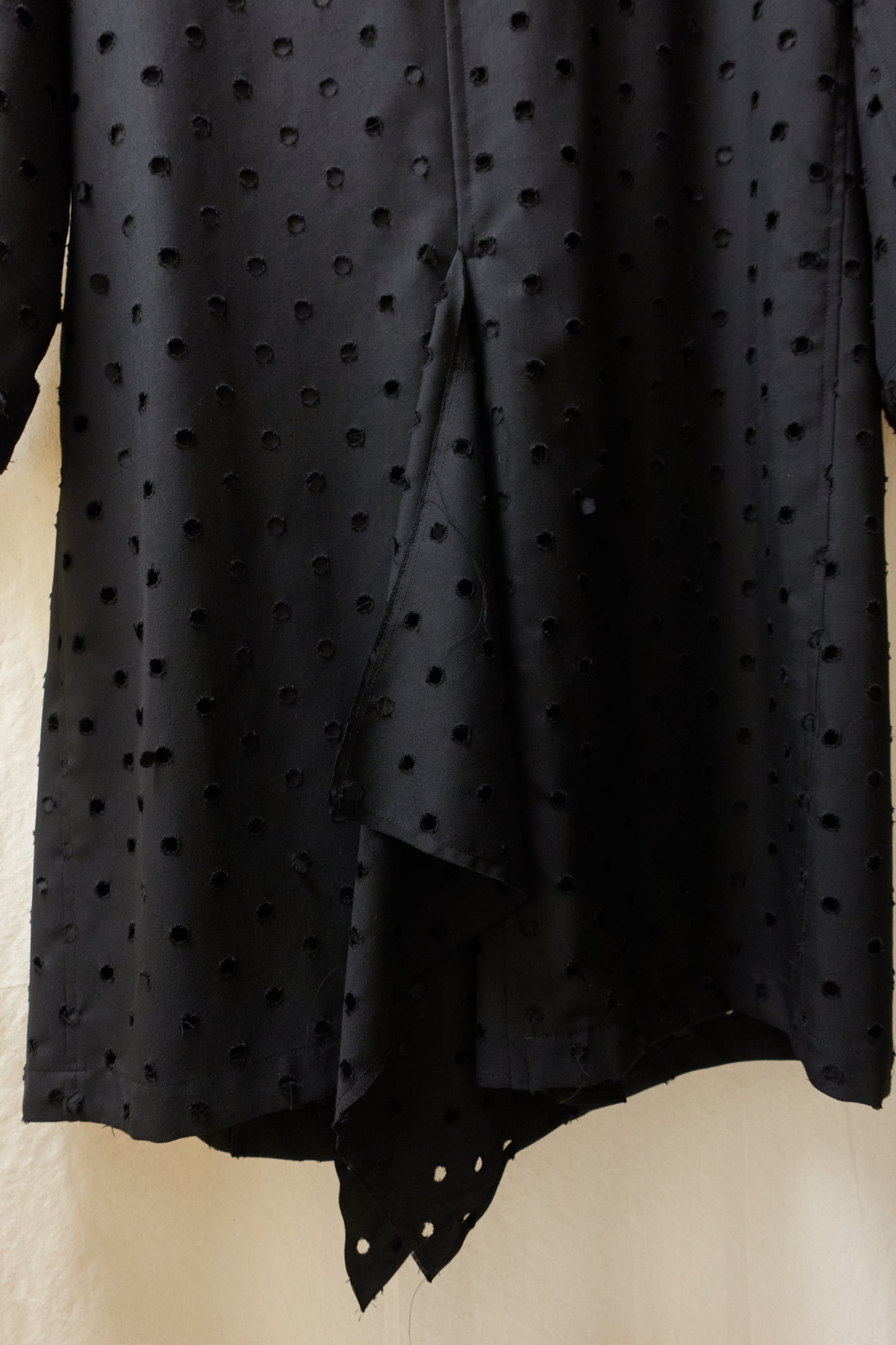 Yohji Yamamoto Y's asymmetrical 'holepunch' coat