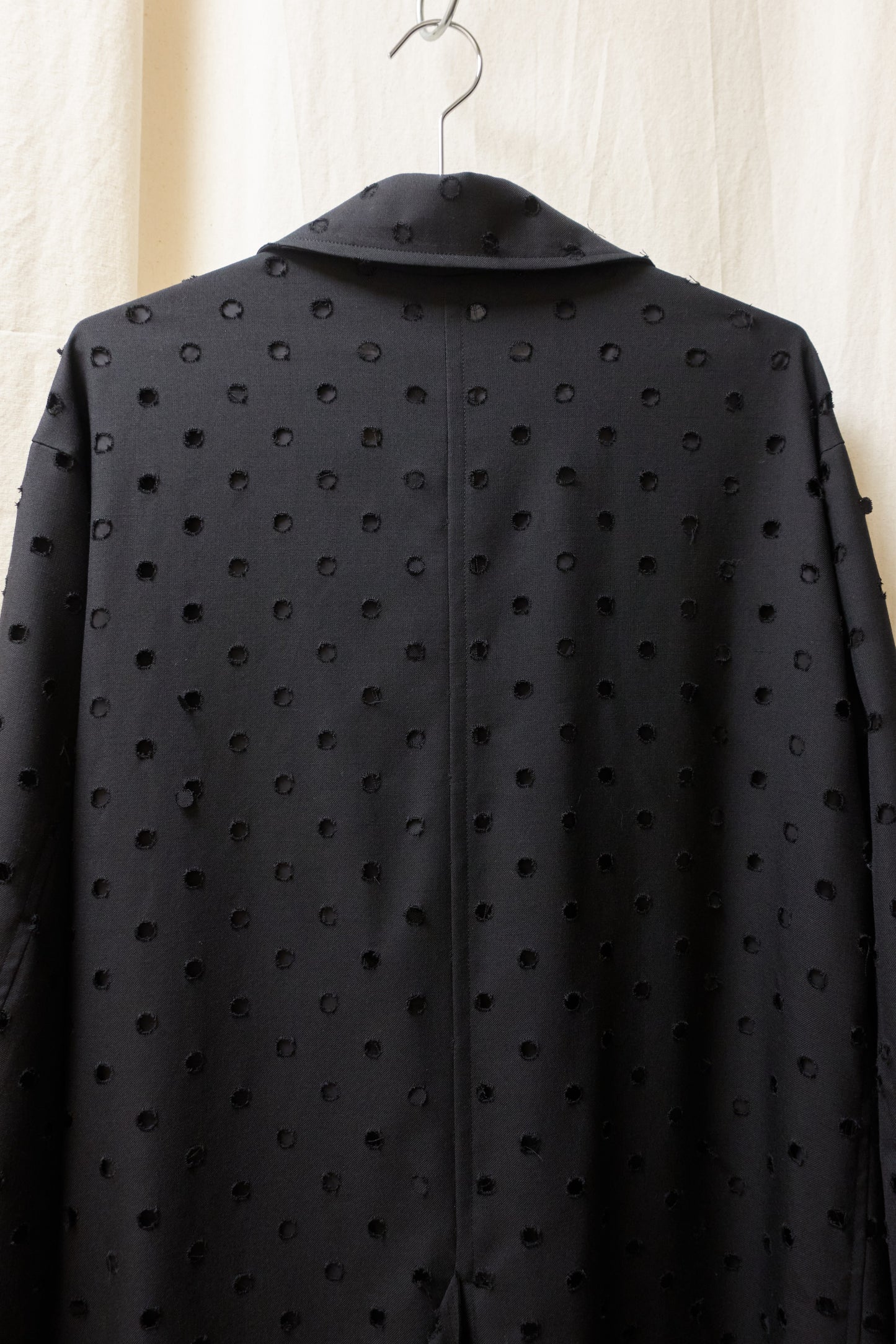 Yohji Yamamoto Y's asymmetrical 'holepunch' coat
