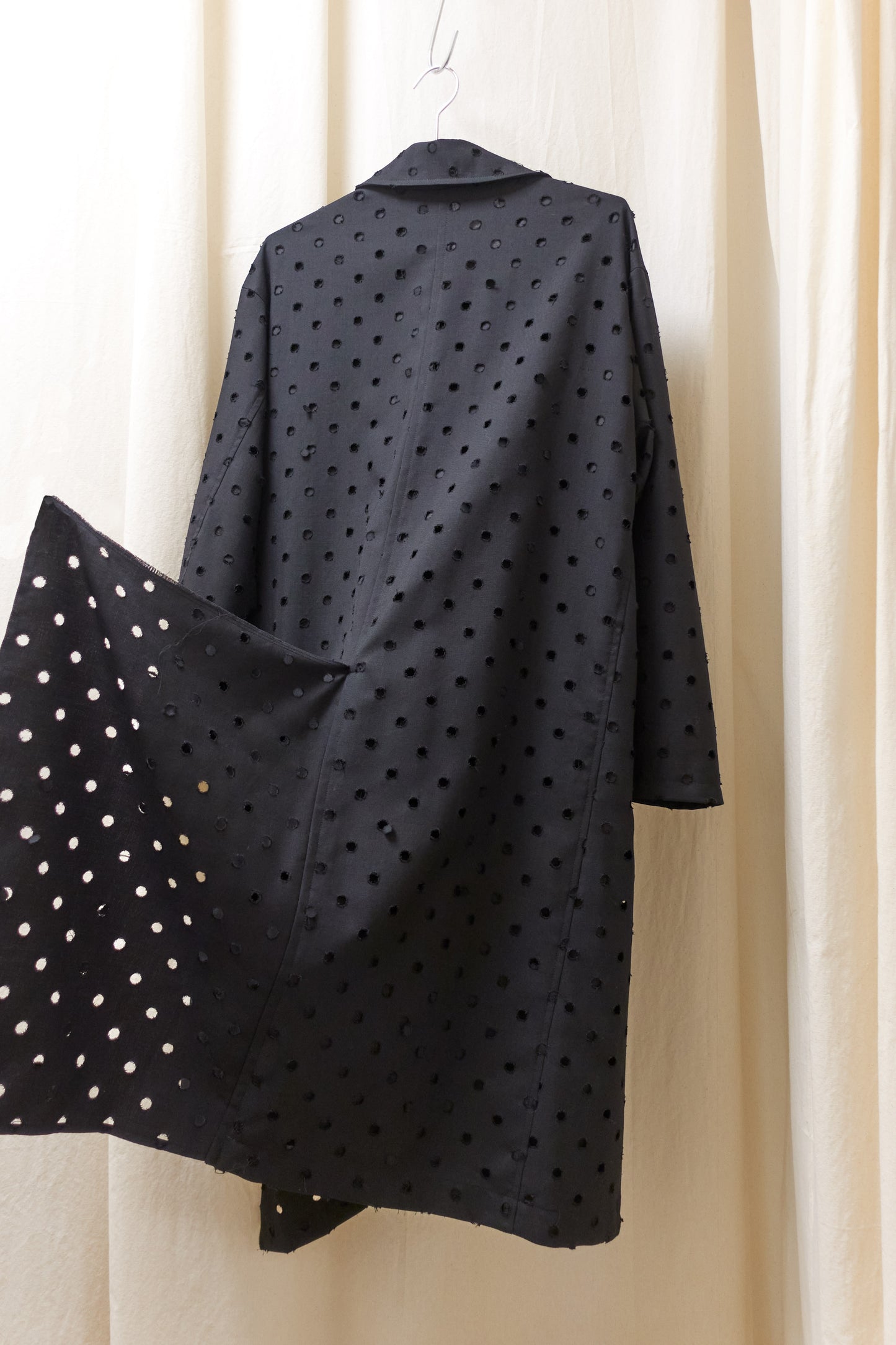Yohji Yamamoto Y's asymmetrical 'holepunch' coat
