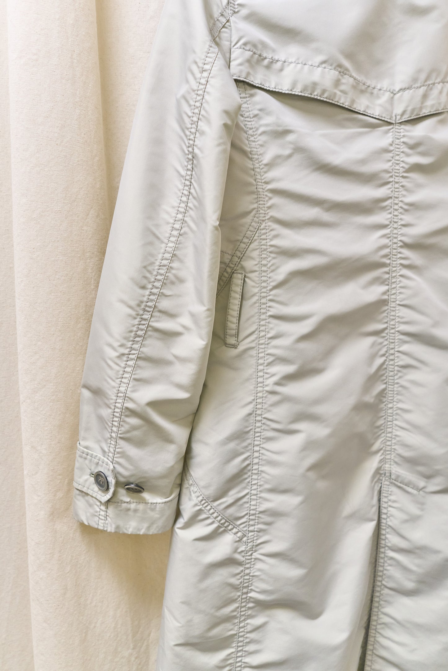 Issey Miyake sheeny trench coat with fluorescent yellow inner