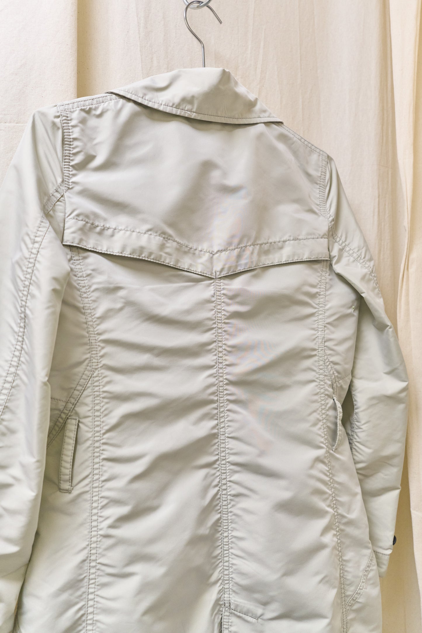 Issey Miyake sheeny trench coat with fluorescent yellow inner