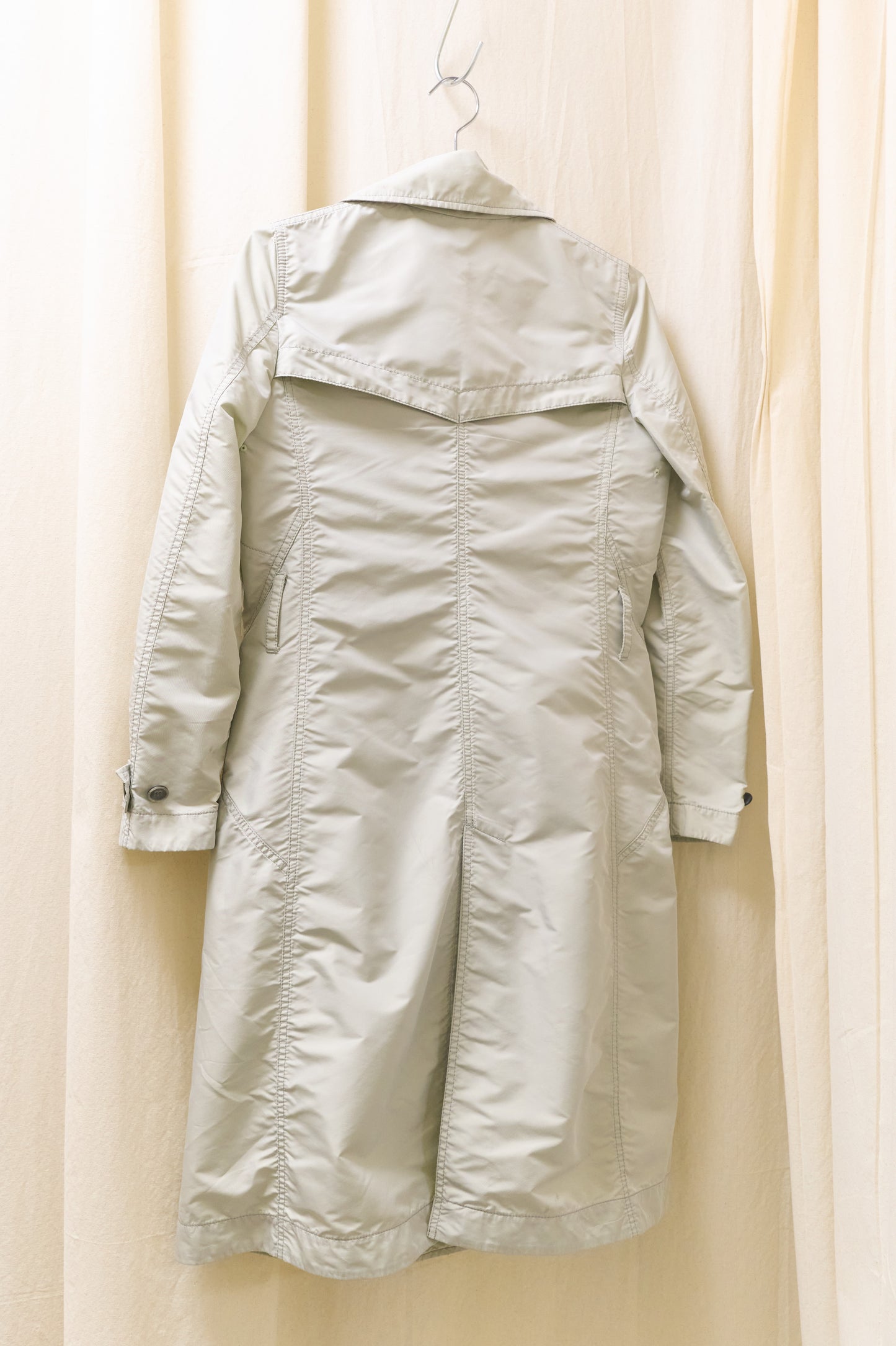 Issey Miyake sheeny trench coat with fluorescent yellow inner