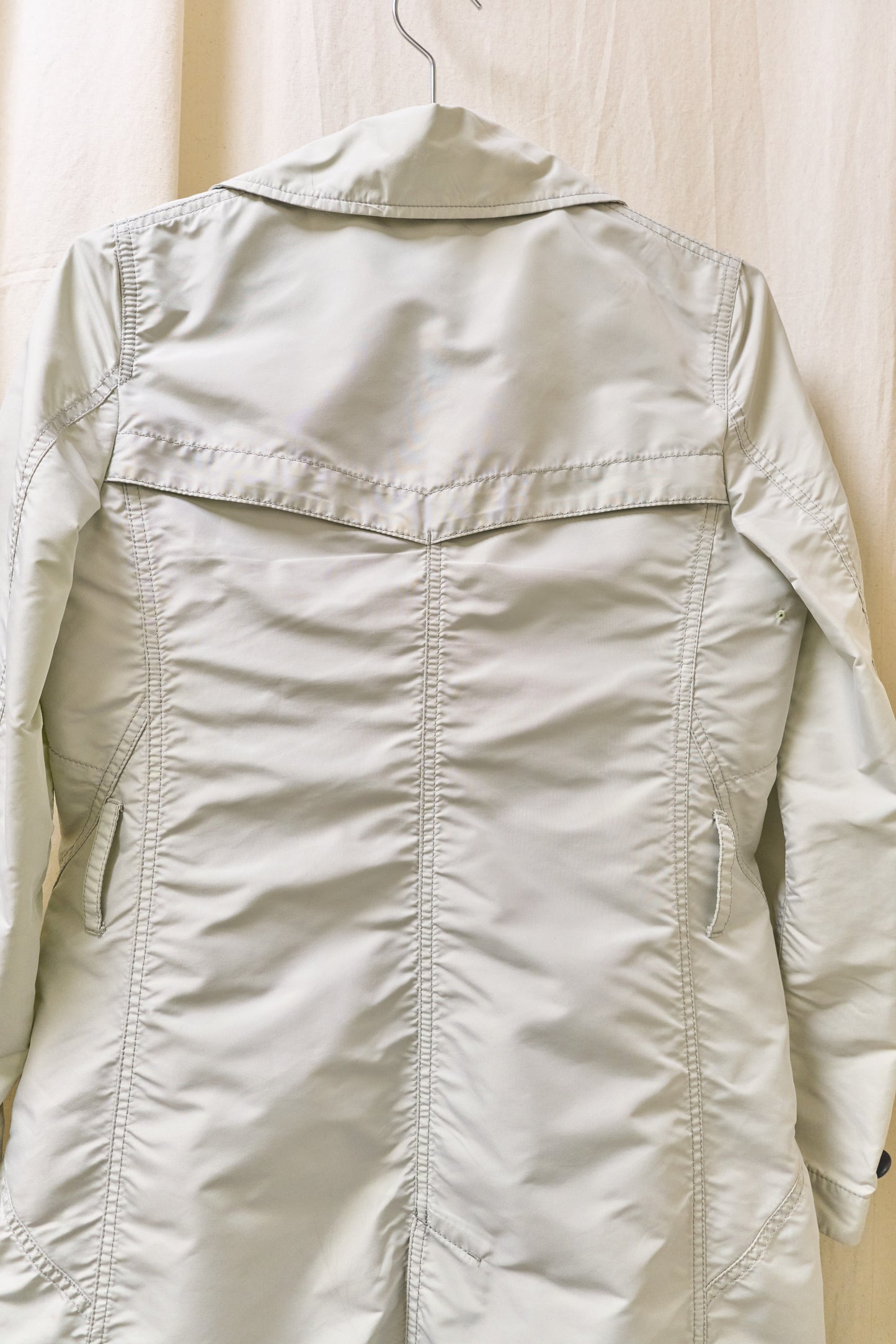 Issey Miyake sheeny trench coat with fluorescent yellow inner