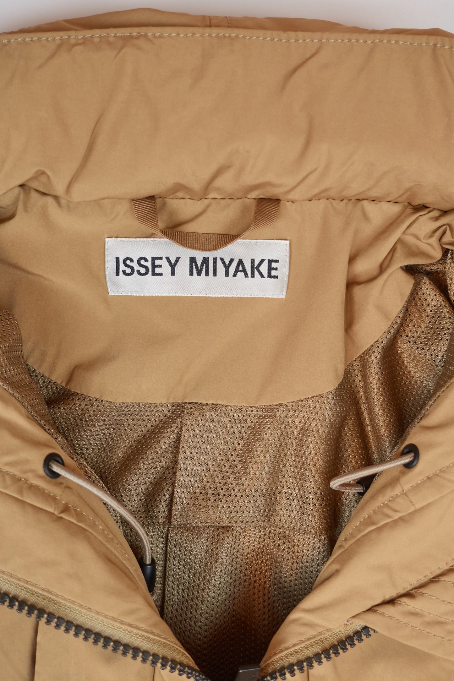 Issey Miyake hooded raincoat with full length zips