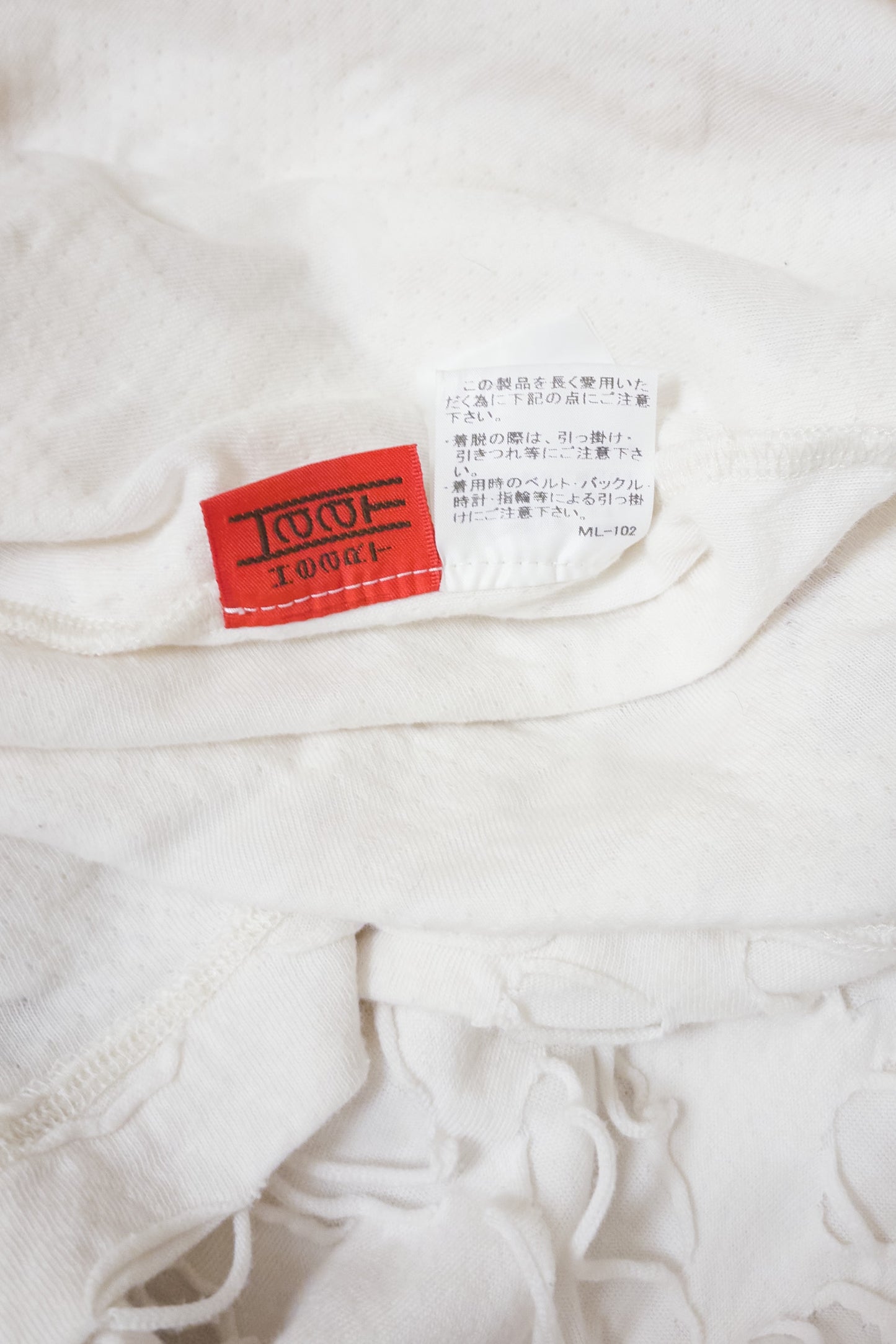 Issey Miyake Haat ‘holey’ jersey dress