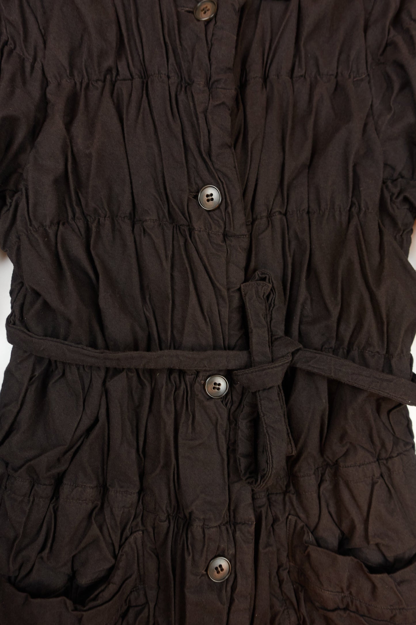 Issey Miyake Permanente shirred coat with waist tie